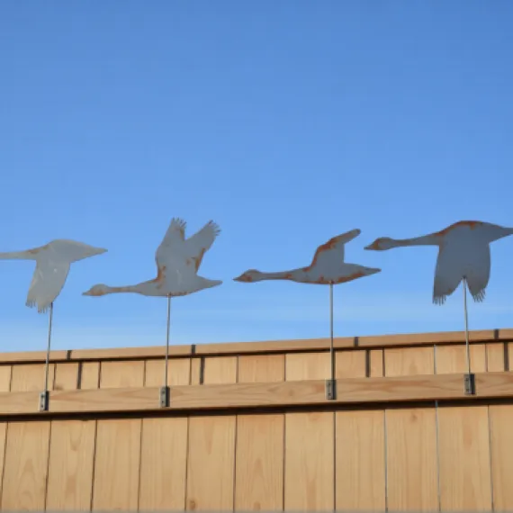 Rustic metal goose fence toppers – handcrafted garden decorations or quirky outdoor gifts for bird lovers